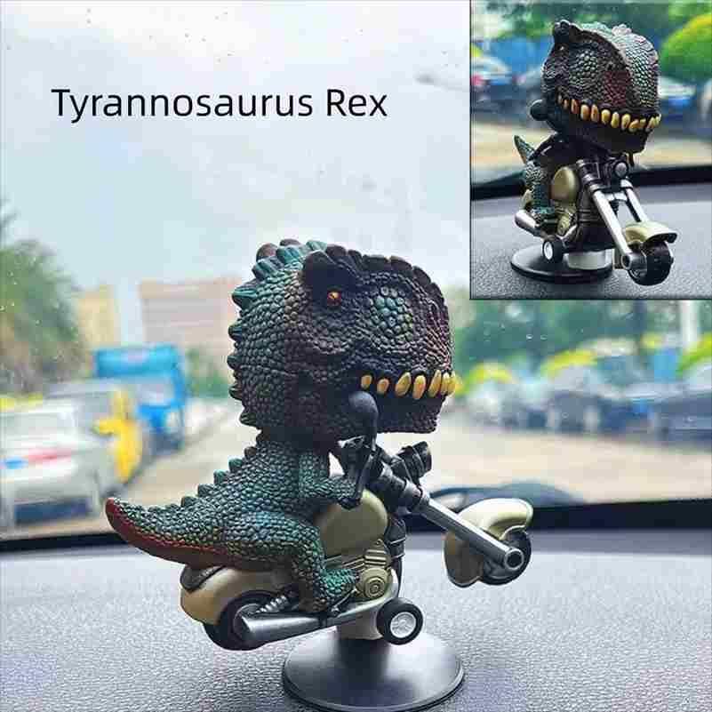 Tyrannosaurus Rex car dashboard accessory with a blurred street scene in the background