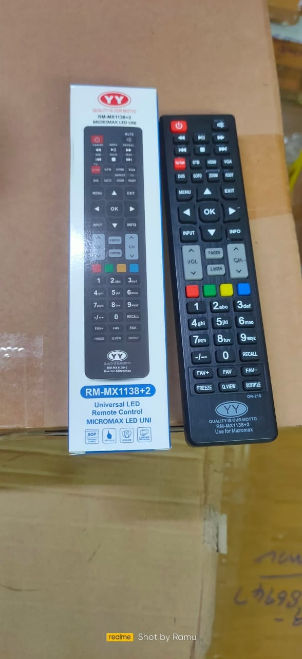 remote controls with a packaging label on a cardboard surface
