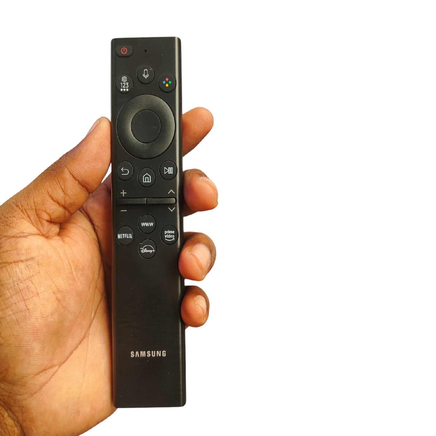 Hand holding a Samsung remote control against a white background