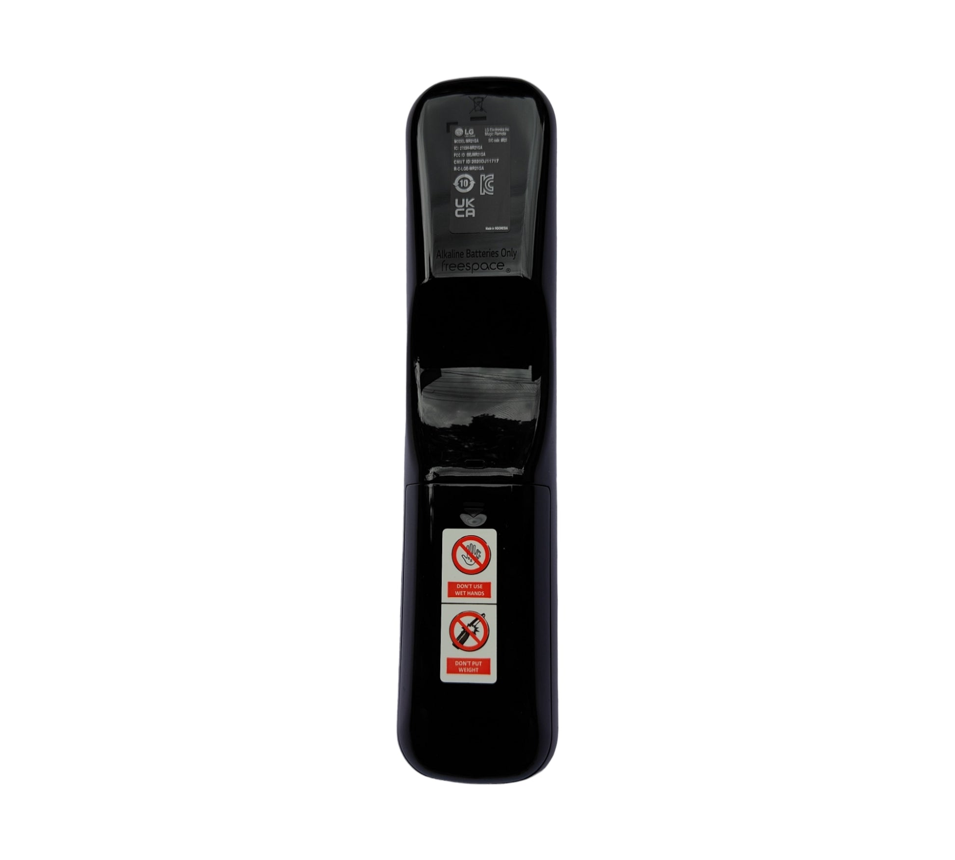 Black electronic device with warning labels on a white background