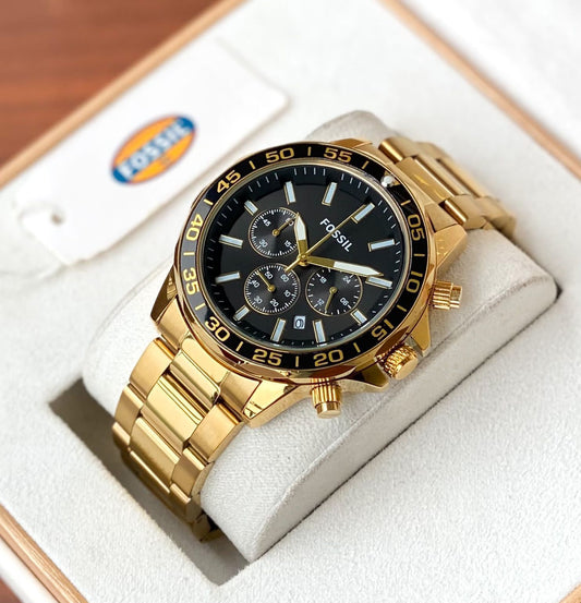Fossil Bronson features a Black satin dial, chronograph movement and Two tone golden metal strap.