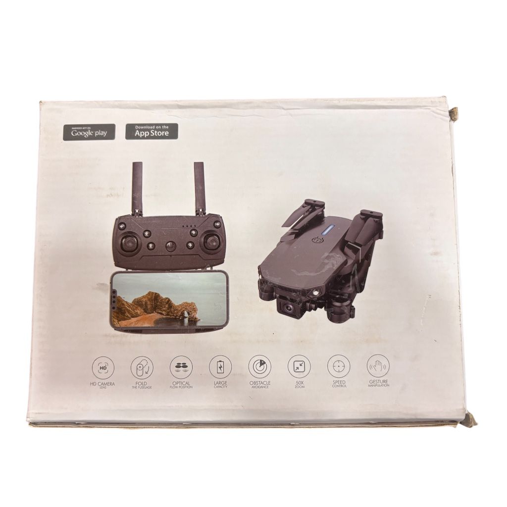 Product packaging with a drone and controller on a beige background