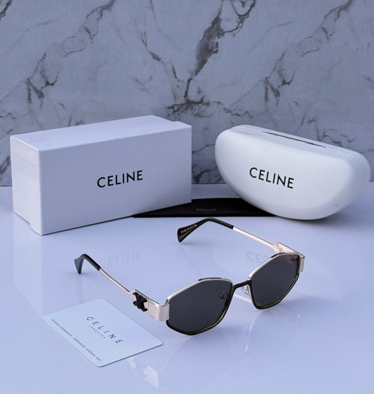 CELINE unisex angular frame sunglasses with dark lenses and silver-tone frame