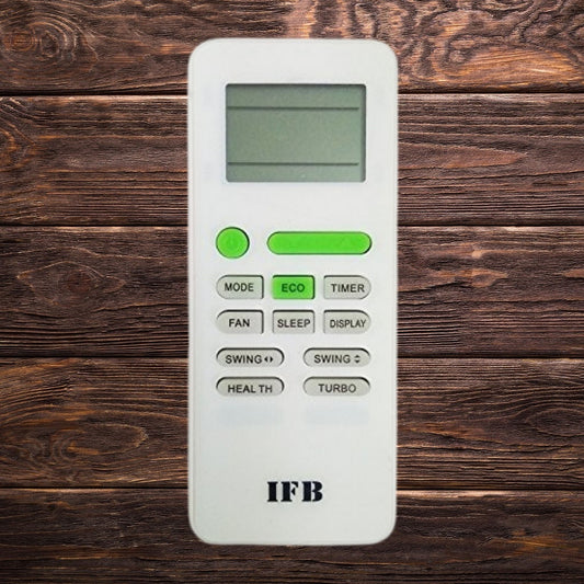 White remote control with green buttons on a wooden surface, featuring the brand 'IFB'.
