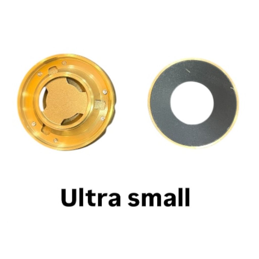 “Bottom view of Kaff brass flame spreader showing gas channel holes”