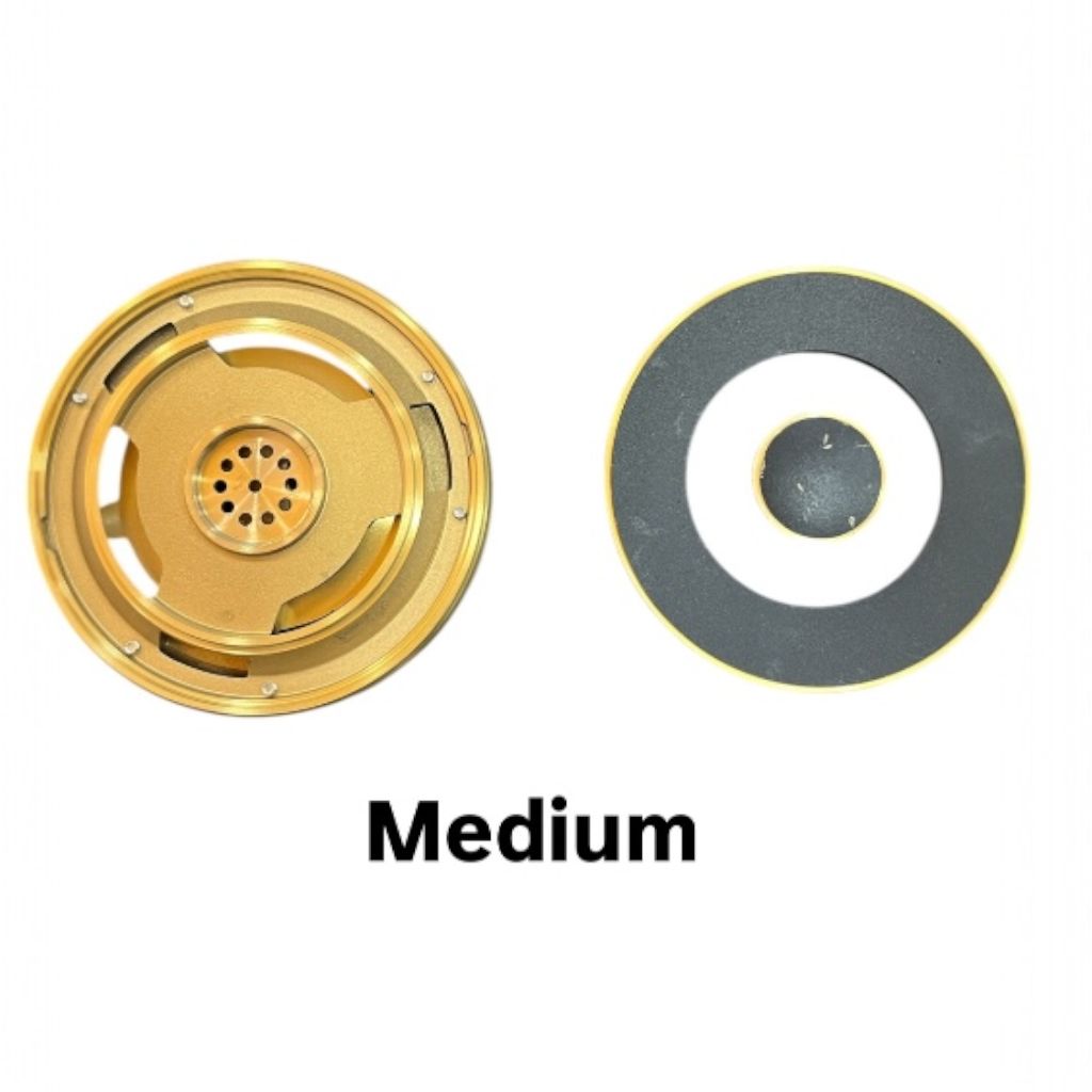 “Kaff small brass flame spreader fitted on cooktop burner”