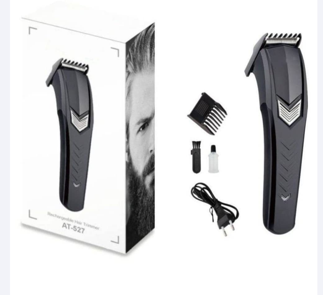 Hair trimmer with packaging, accessories, and plug on a white background