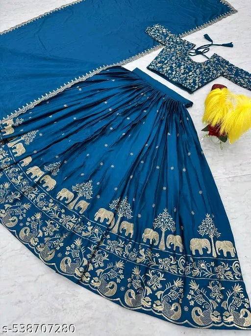 Blue saree with white patterns on a white background
