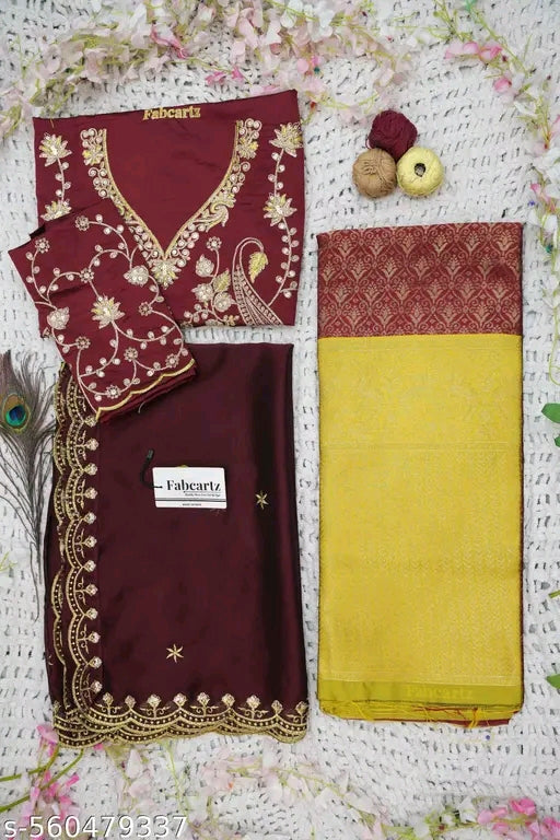 Maroon and yellow saree with embroidery on a floral background