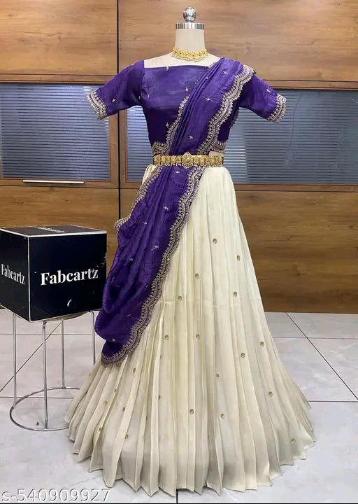 Purple and white saree on a mannequin with Fabcartz branding in the background