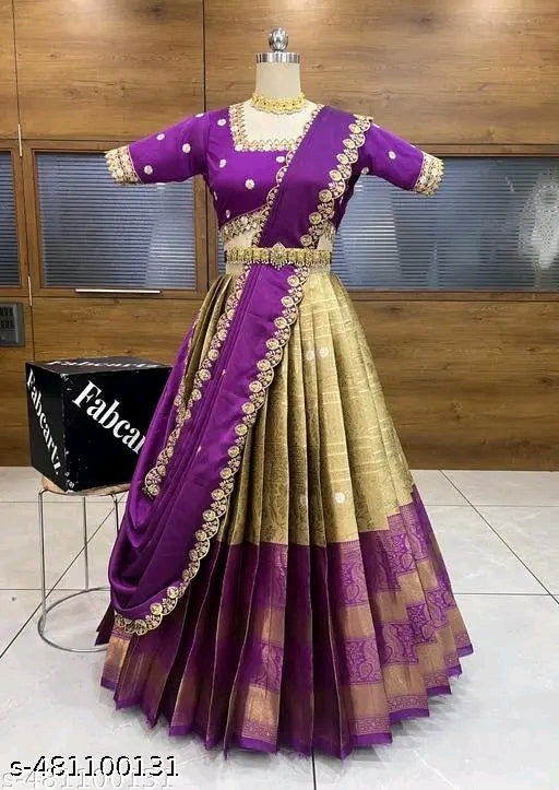 Purple and gold traditional outfit on a mannequin with 'Fabcar' branding in the background.