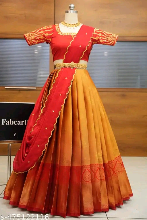 Red and orange traditional outfit on a mannequin with a wooden background