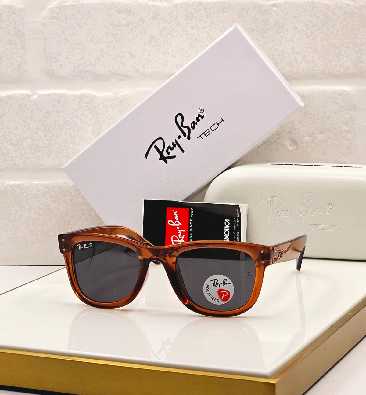Rayban unisex sunglasses with brown frame and dark polarized lenses