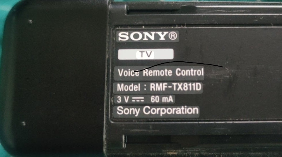 Sony RMF-TX811D remote control model number and battery specs label